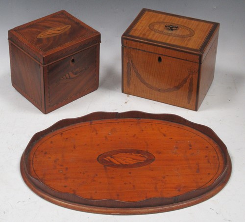 Lot 106 - A late George III mahogany shell inlaid tea...