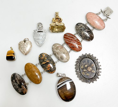 Lot 319 - A hardstone bracelet, together with three...
