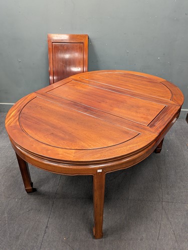 Lot 745 - A Chinese hardwood d-end extending dining...