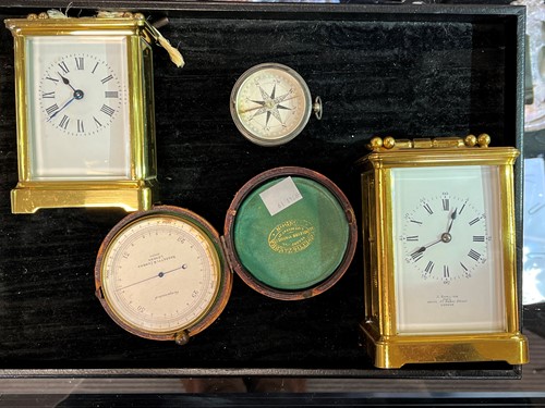 Lot 293 - A striking carriage clock, a further carriage...