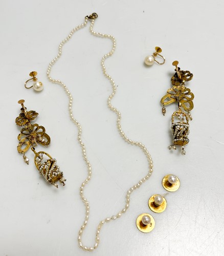 Lot 344 - A pair of seed pearl ear pendants tested as...