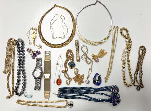 Lot 317 - A collection of costume jewellery, including...