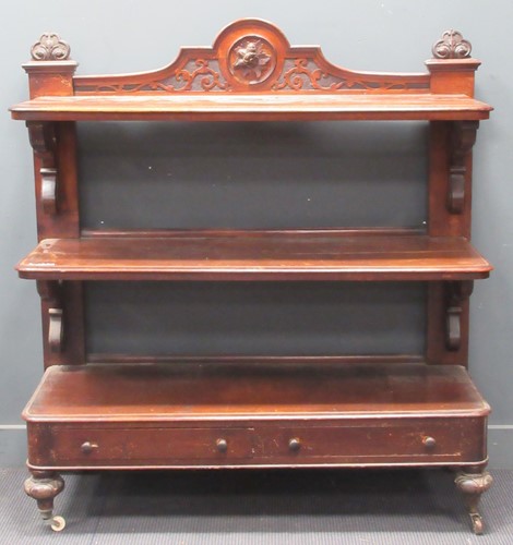 Lot 667 - A Victorian three tier buffet with...