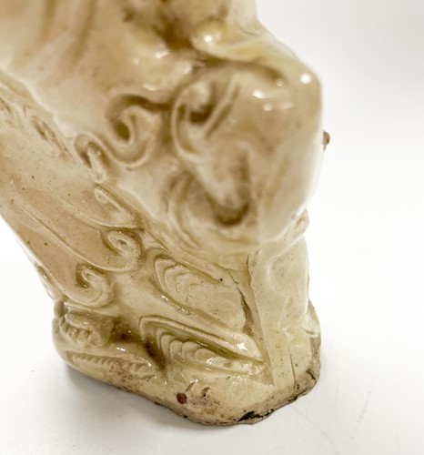 Lot 1 - A Chinese Cizhou figure of Guanyin with child, early 17th century