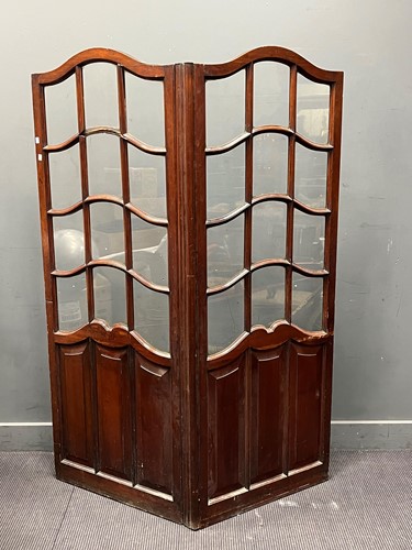 Lot 497 - A 19th century mahogany two fold screen with...