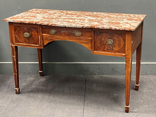 Lot 417 - A marble topped washstand with slightly bowed...
