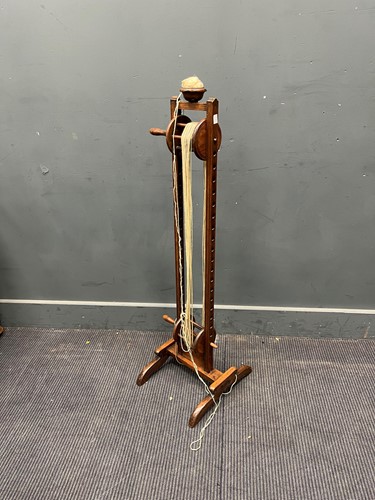 Lot 621 - A fruitwood floor standing wool winder, late...