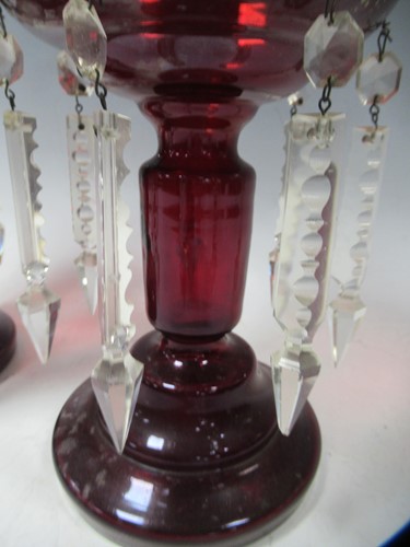 Lot 2 - A pair of ruby glass lustres, 28cm high