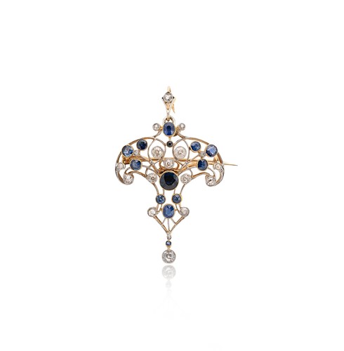 Lot 122 - An Art Nouveau sapphire and diamond pendant/brooch