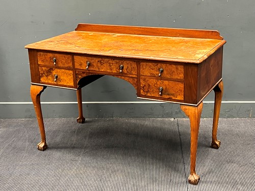 Lot 553 - A George III style walnut dressing table on...