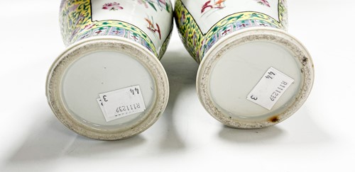 Lot 46 - A pair of Chinese Cantonese porcelain vases, late Qing Dynasty, circa 1900