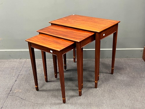 Lot 468 - A nest of three mahogany rectangular tables,...