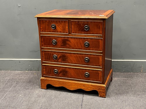 Lot 617 - A reproduction mahogany chest of drawers,...