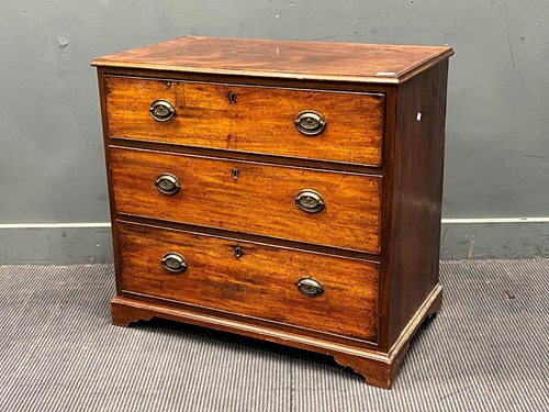 Lot 616 - A George III mahogany chest of three long...