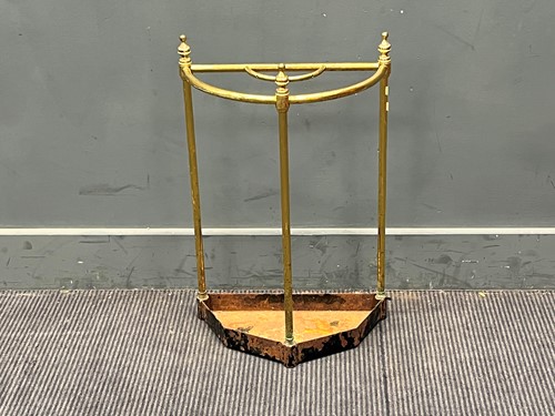 Lot 579 - An Edwardian D-shaped brass stick stand. 62cm...