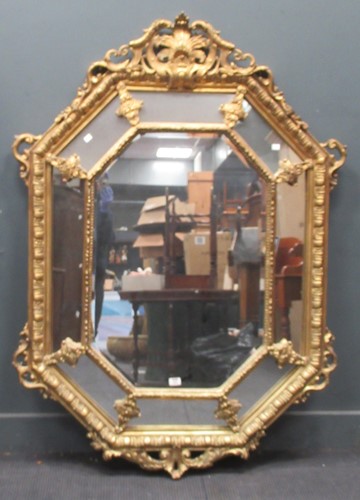 Lot 635 - A modern octagonal cushion moulded gilded...