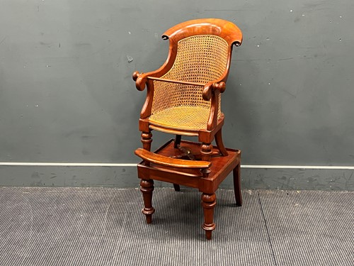 Lot 566 - A 19th century mahogany child's caned bergere...