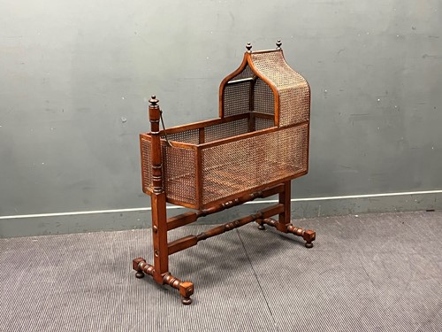 Lot 565 - A Regency mahogany caned rocking cradle on...