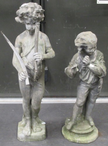 Lot 694 - A lead garden statue of a piping Putto...