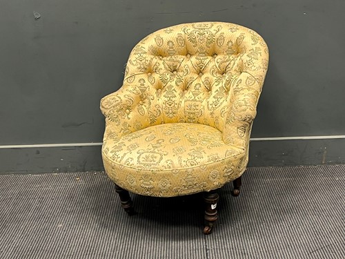 Lot 682 - A late 19th century low button back armchair...