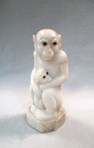 Lot 45 - An early 20th century carved marble monkey & baby bearing F. Barwig signature