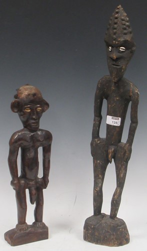 Lot 135 - A carved wood figure from Papua New Guinea...