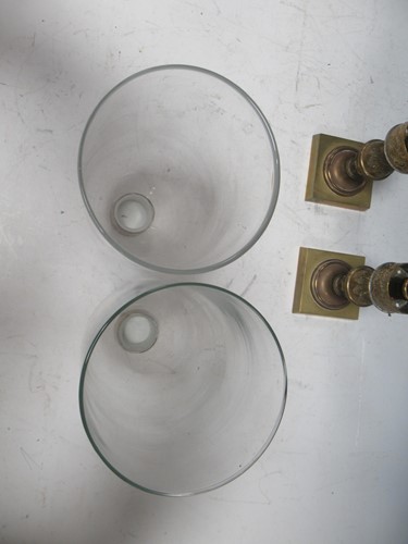 Lot 27 - A pair of Regency brass candle holders or...