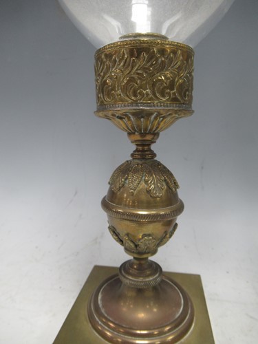 Lot 27 - A pair of Regency brass candle holders or...
