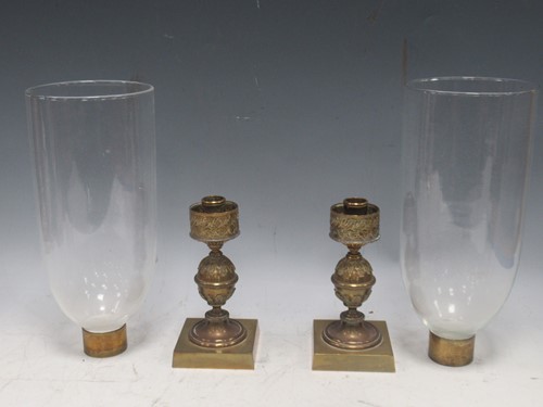 Lot 27 - A pair of Regency brass candle holders or...