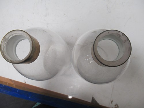 Lot 27 - A pair of Regency brass candle holders or...