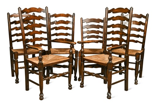 Lot 462 - A set of eight ash ladder back chairs with rush seats, 20th century