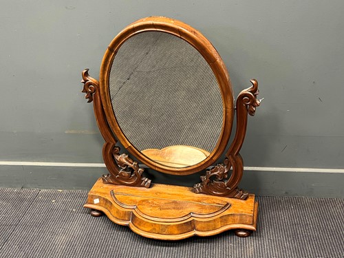 Lot 508 - A Victorian mahogany swing mirror, the oval...