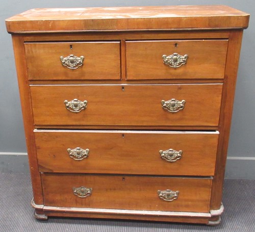 Lot 550 - A late 19th century walnut chest of drawers...