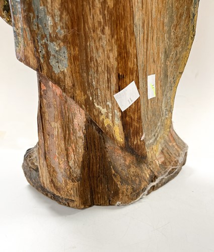 Lot 17 - A French carved and polychrome painted figure of a saint, mid-17th century