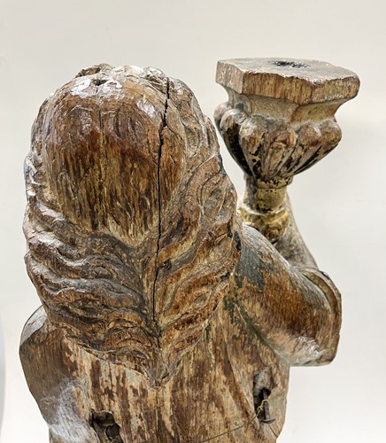 Lot 17 - A French carved and polychrome painted figure of a saint, mid-17th century