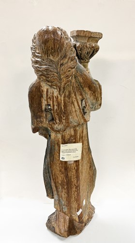 Lot 17 - A French carved and polychrome painted figure of a saint, mid-17th century