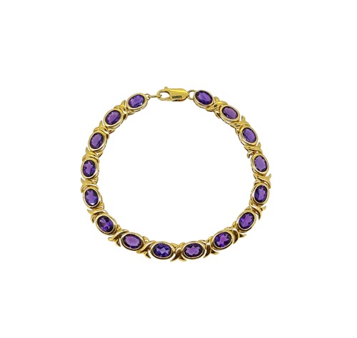 Lot 91 - An amethyst line bracelet