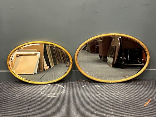 Lot 481 - Two similar Regency style gilt framed oval...