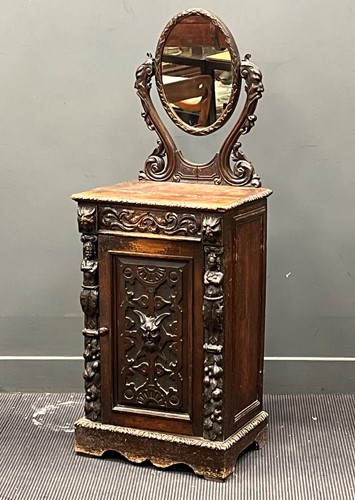Lot 445 - A Victorian Jacobean revivial carved oak...