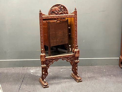 Lot 479 - An early 20th century carved hardwood and...