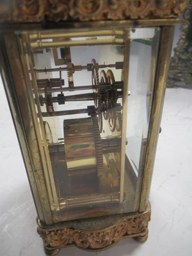 Lot 21 - Two brass carriage clocks and a stained green...