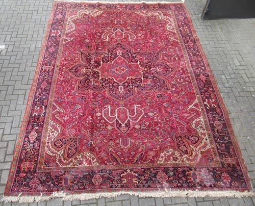 Lot 606 - A Heriz carpet 432 x 308cm