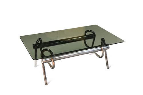 Lot 698 - A glass topped chrome coffee table