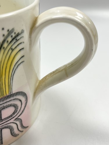 Lot 15 - Eric Ravilious for Wedgwood, a Queen Elizabeth II commemorative coronation mug, 1953