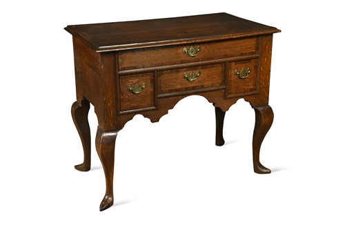 Lot 511 - An oak and mahogany crossbanded lowboy, 18th century