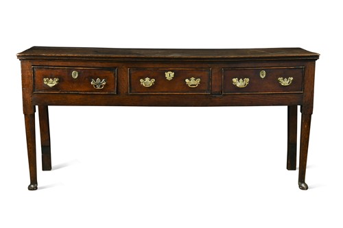 Lot 561 - A George III oak dresser