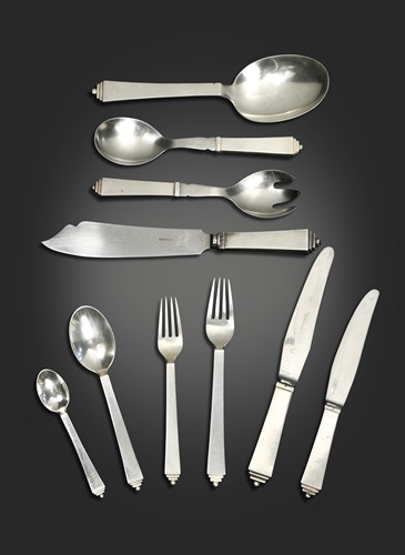 Lot 131 - Harold Nielsen for Georg Jensen, a composed Danish metalwares Pyramid pattern flatware service