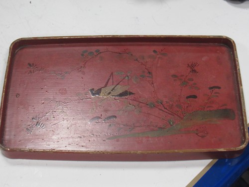 Lot 17 - A Chinese red lacquered tray; a model Buddha;...