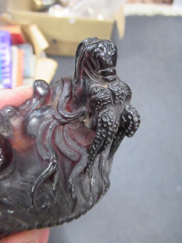 Lot 17 - A Chinese red lacquered tray; a model Buddha;...