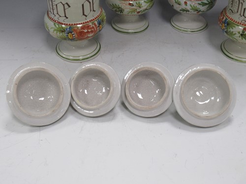 Lot 11 - Two pairs of continental faience albarellos,...
